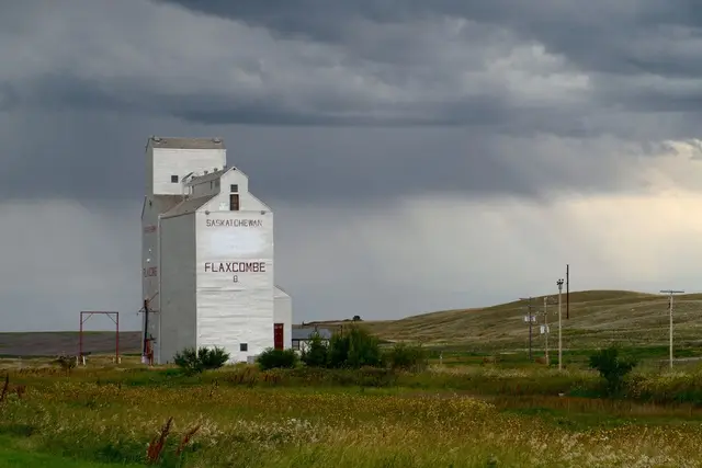 Flaxcombe grain elevator under storm clouds